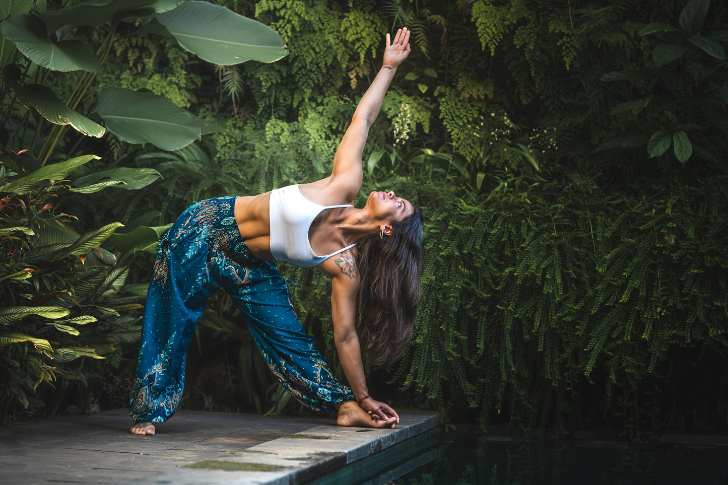 Airy harem pants with an elephant pattern in turquoise with pockets