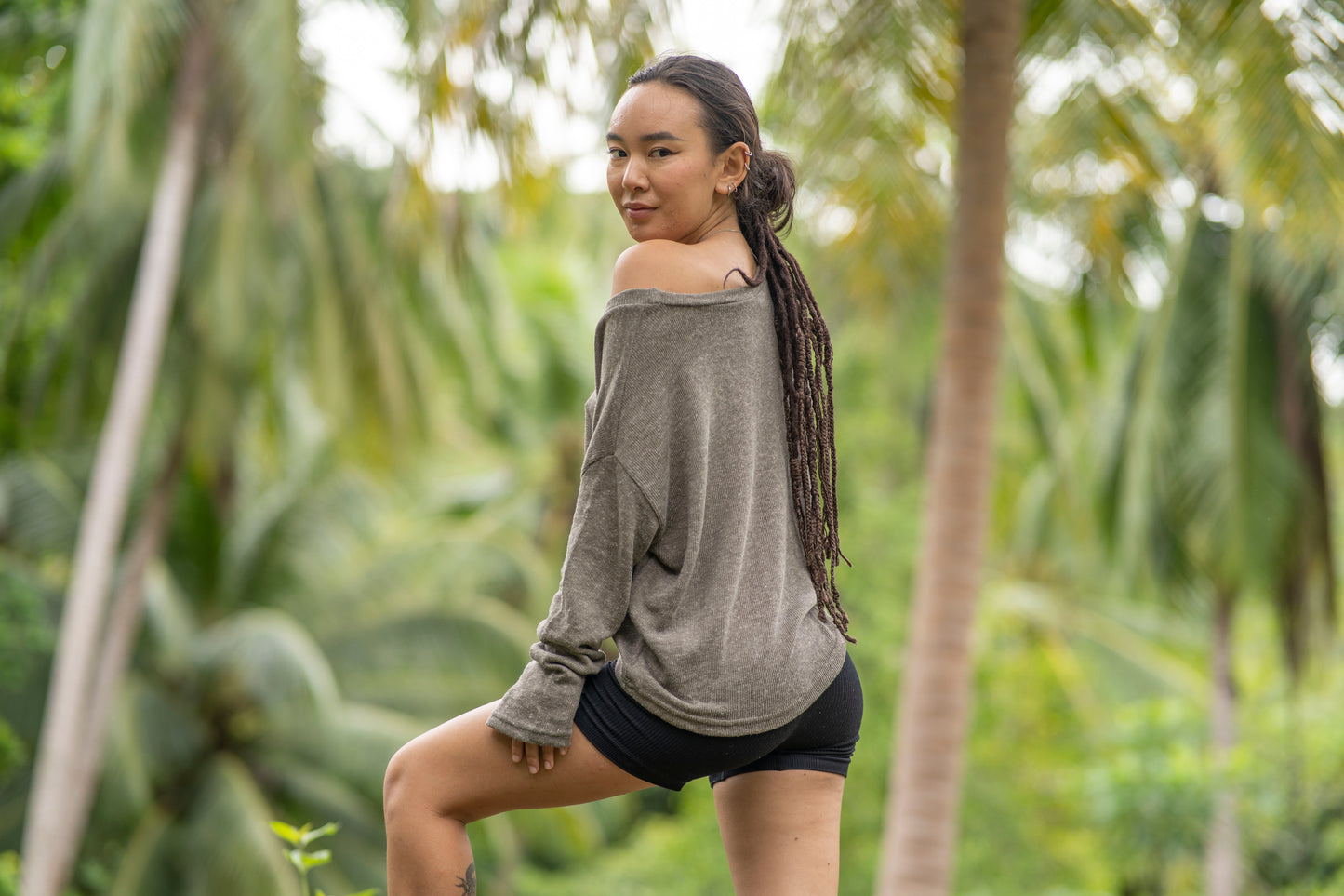 half-length, loose knitted top in kaki green