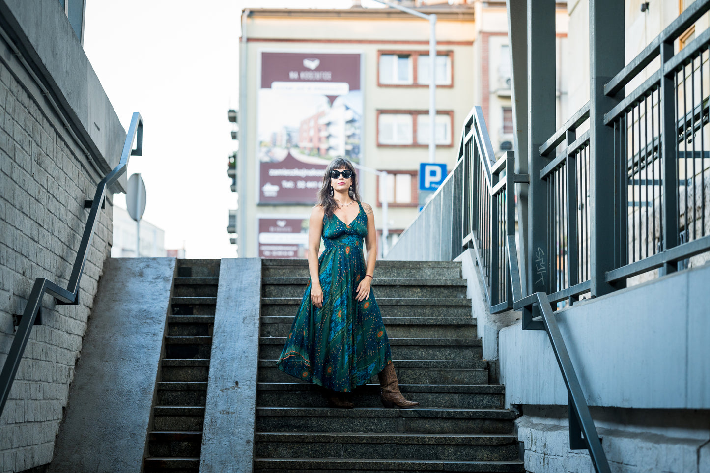 Sleeveless dress with ruffles, kaki green pattern