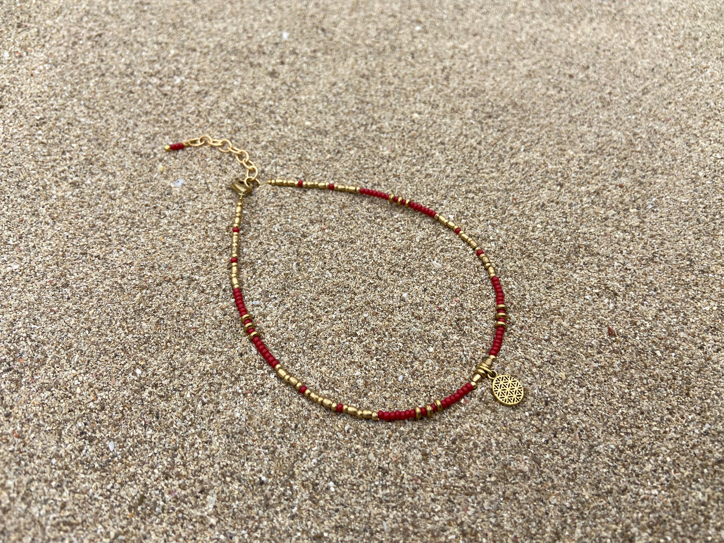 Anklet with the motif of the flower of life made of brass