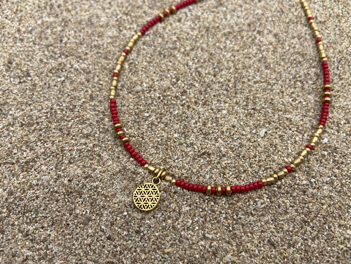 Anklet with the motif of the flower of life made of brass