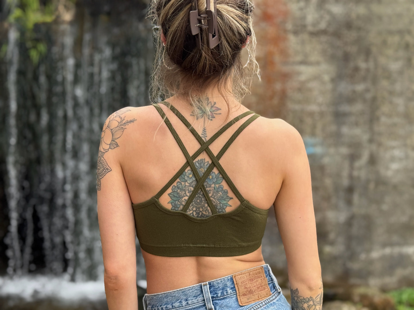 Yoga top with the pattern of the flower of life olive green