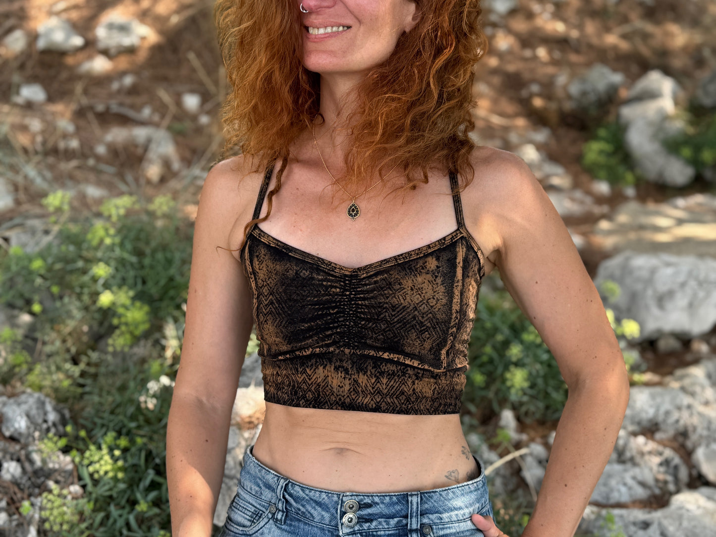 Yoga top with the pattern of the flower of life olive green
