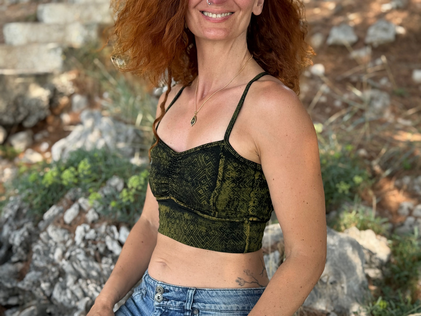 Yoga top with the pattern of the flower of life olive green