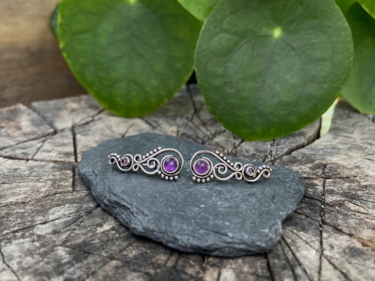 Earclimber earrings with amethyst stones made of silver