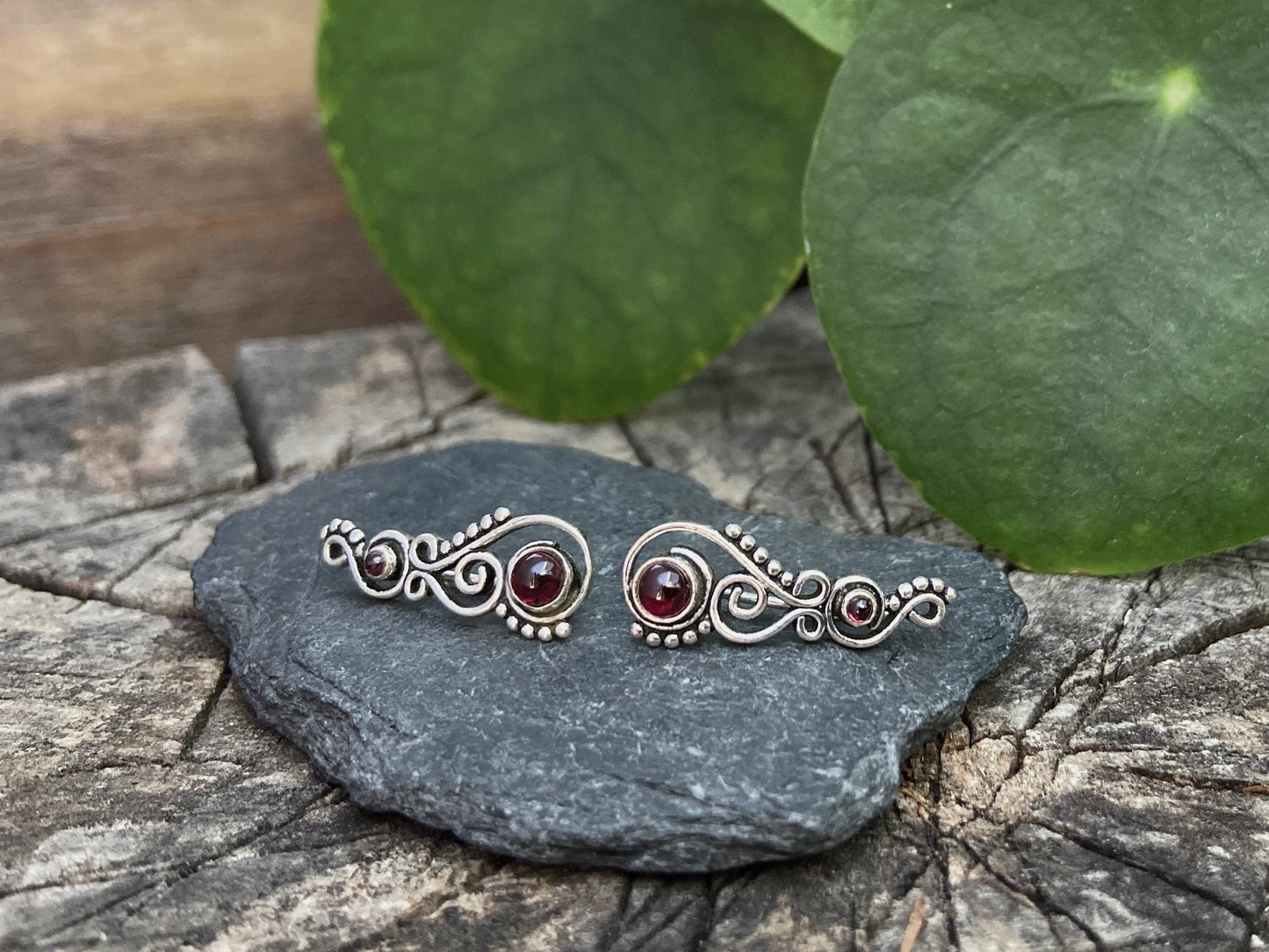 Earclimber earrings with garnet stones made of silver
