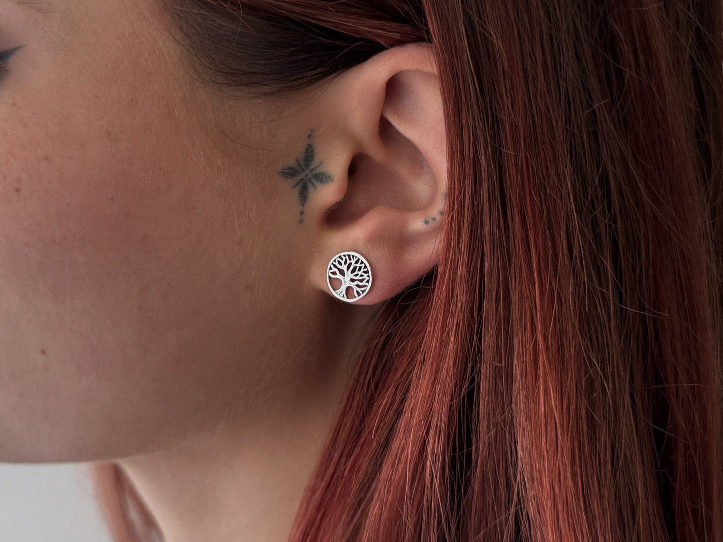 small angel wing stud earrings made of silver