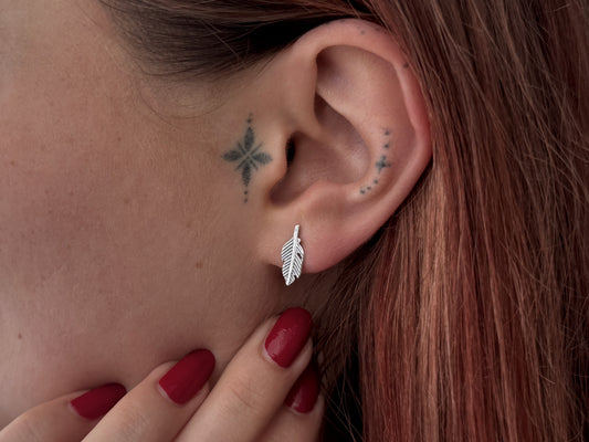 small angel wing stud earrings made of silver