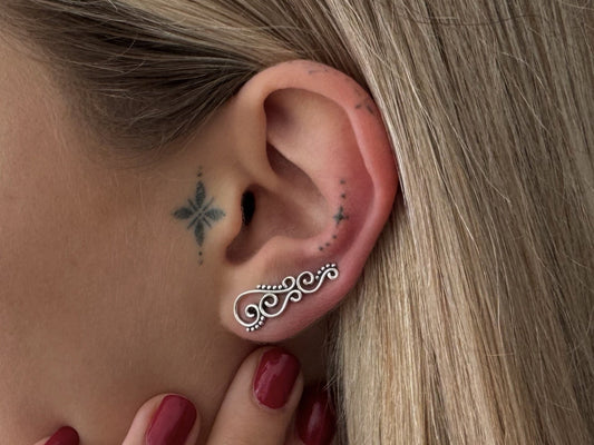 Earclimber earrings with spirals and dots made of silver