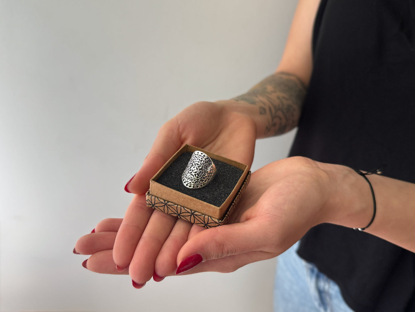 playful ring decorated with silver dots