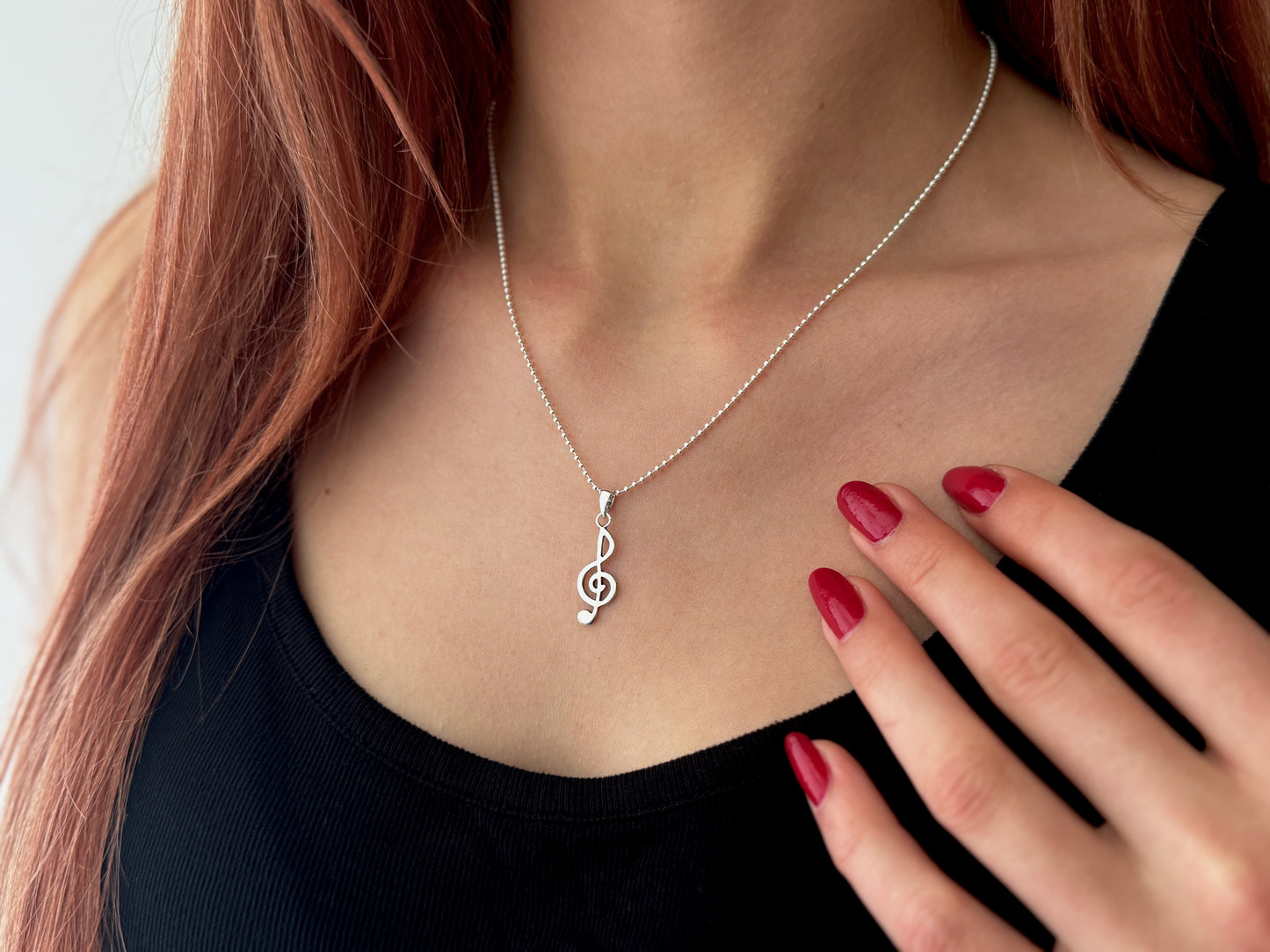 Ball chain with small treble clef made of silver