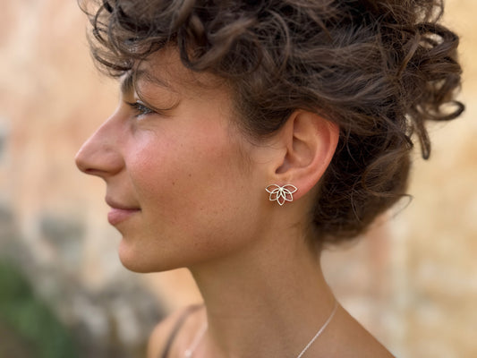 Silver half lotus flower stud earrings