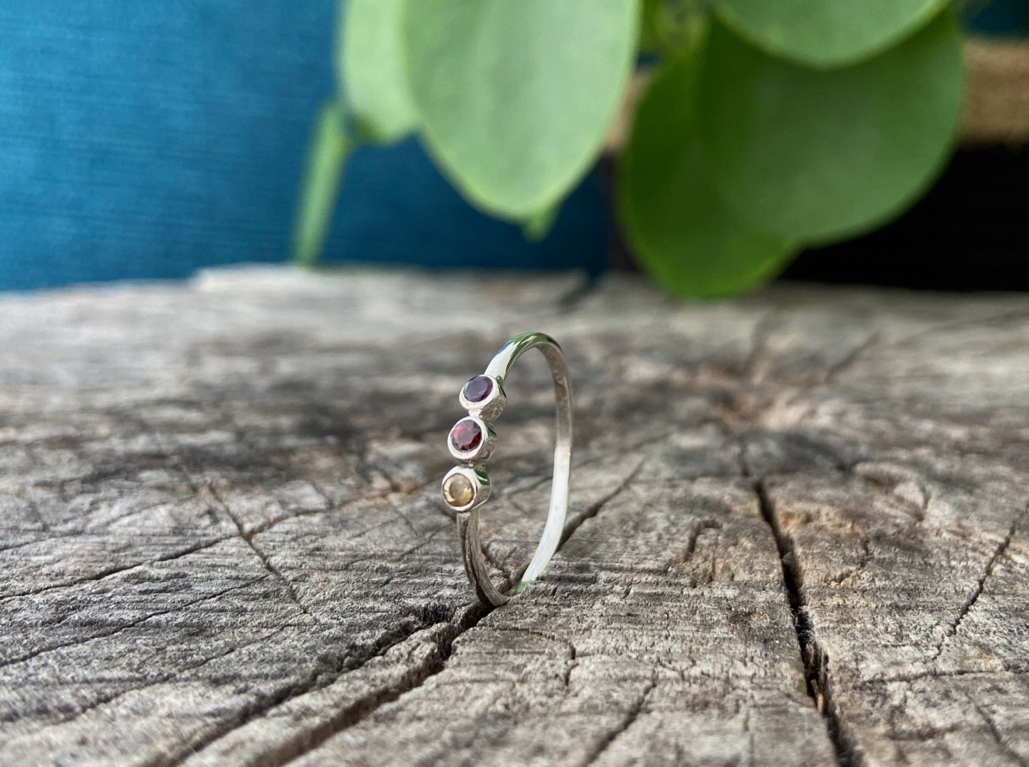 filigree ring with beads and three small faceted stones made of silver