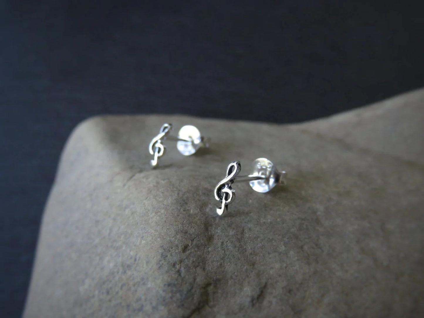 small angel wing stud earrings made of silver