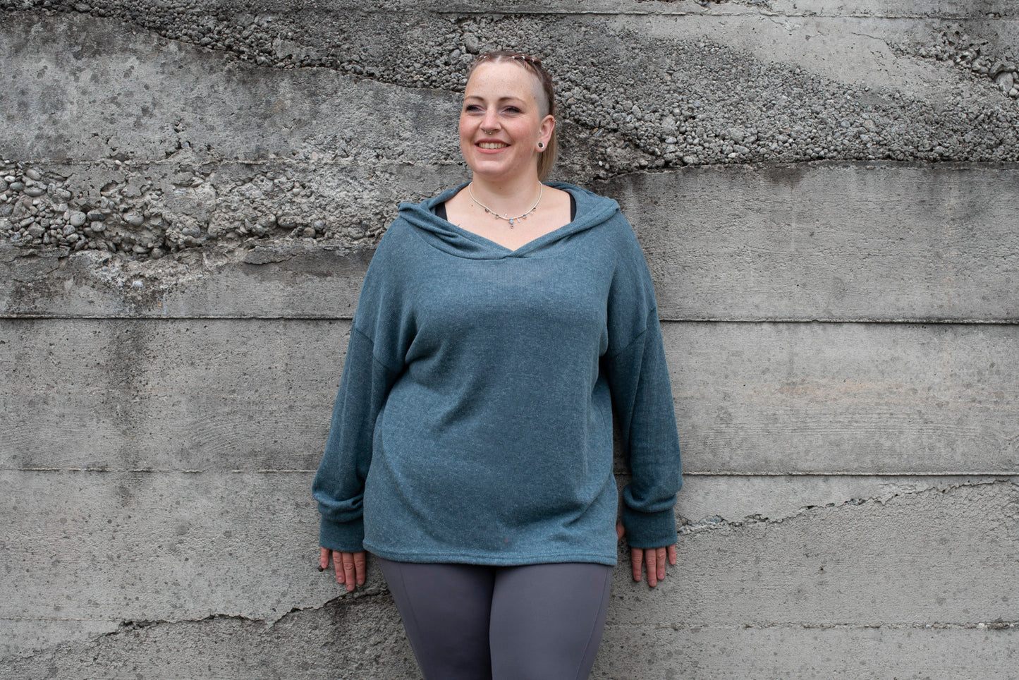 PLUS SIZE, long, plain knitted sweater with a large hood and thumbholes in blue