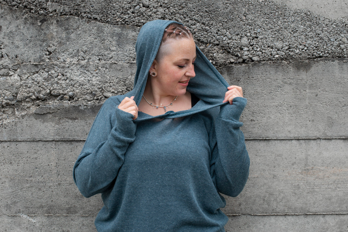 PLUS SIZE, long, plain knitted sweater with a large hood and thumbholes in blue