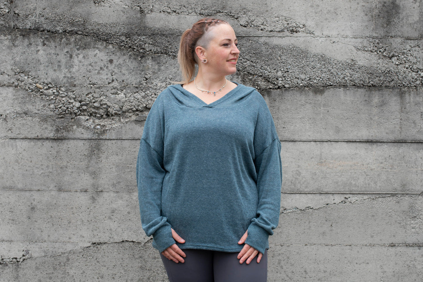 PLUS SIZE, long, plain knitted sweater with a large hood and thumbholes in blue