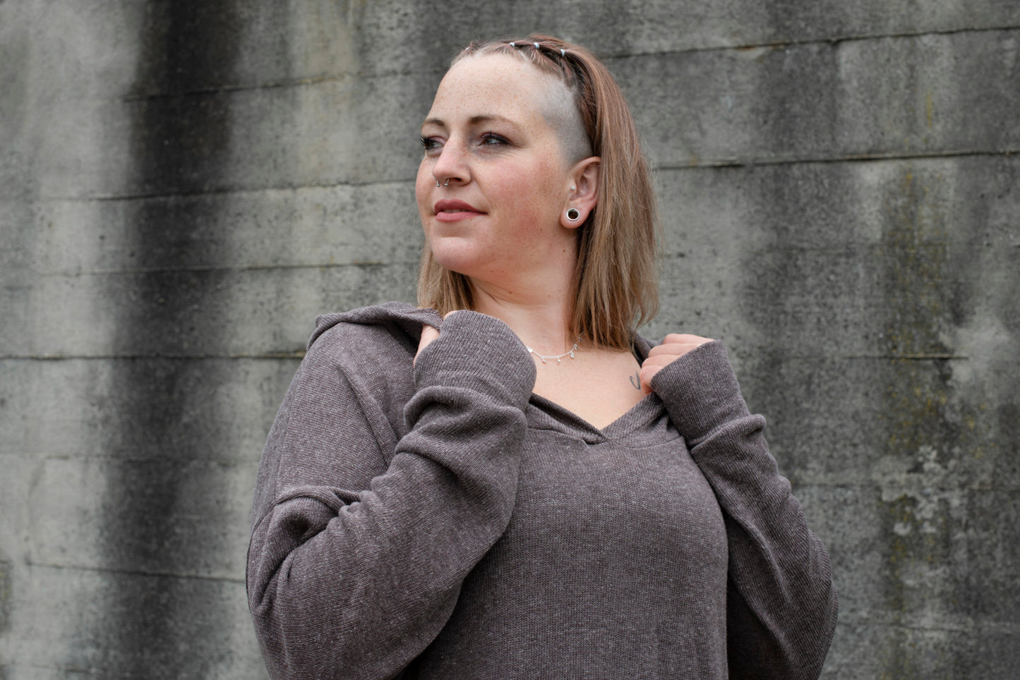 PLUS SIZE, long, plain knitted sweater with a large hood and thumbholes in brown