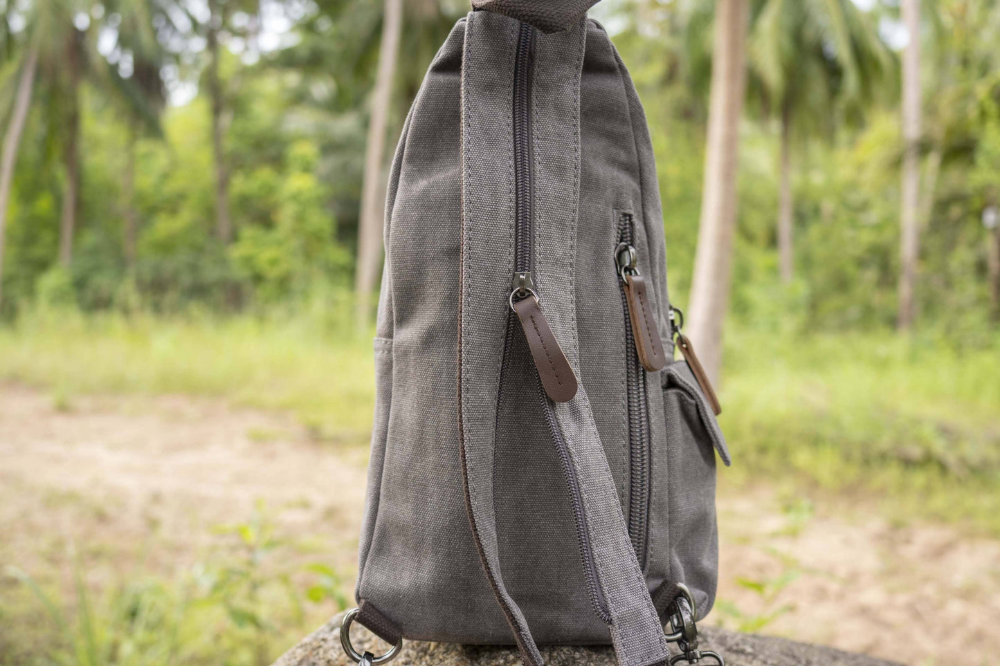 practical canvas shoulder bag with straps in gray