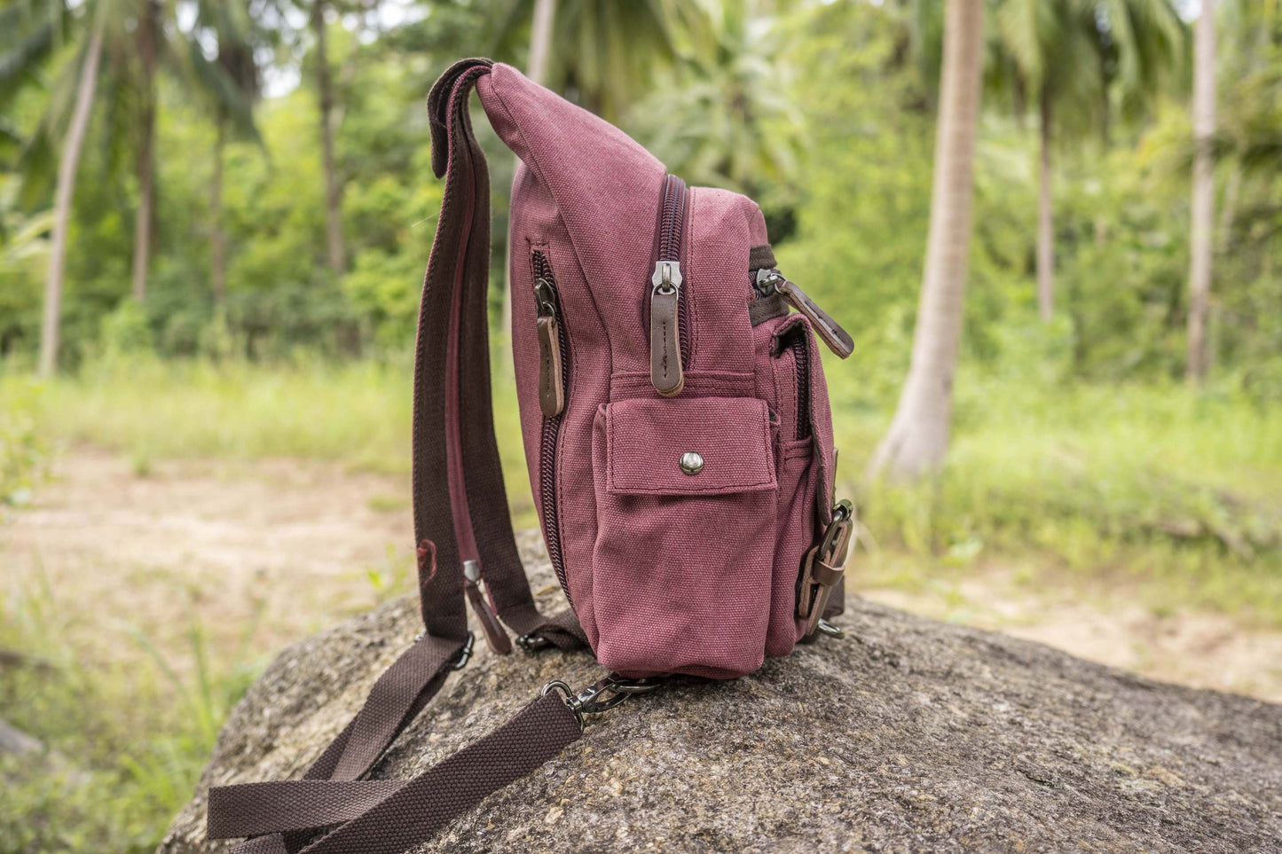 practical canvas shoulder bag with straps in red