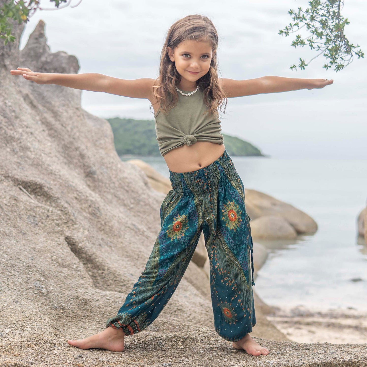 turquoise orange patterned harem pants with peacock pattern for children