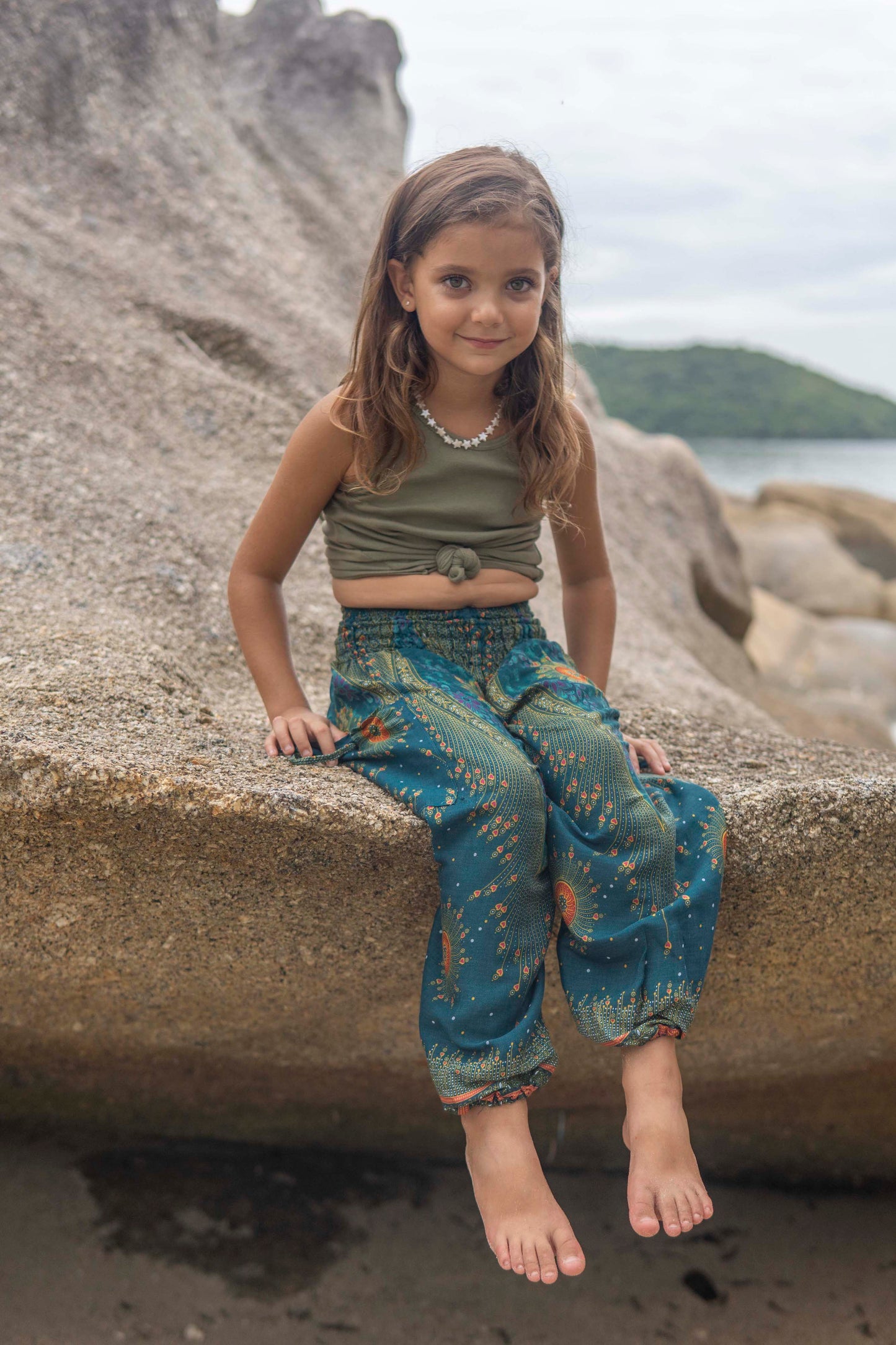 turquoise orange patterned harem pants with peacock pattern for children