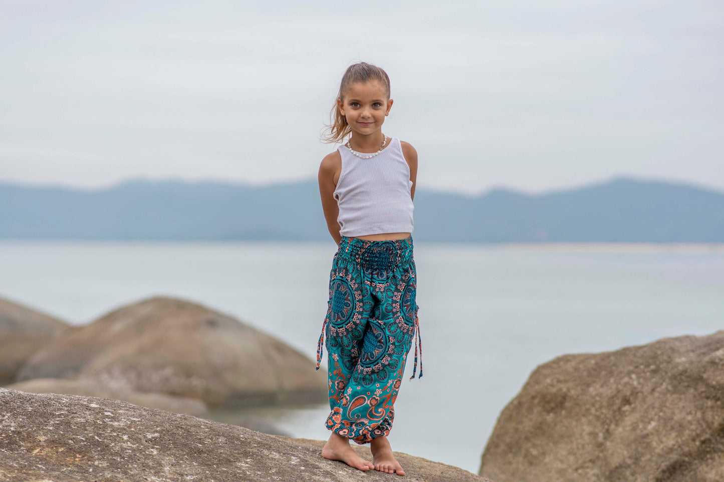 türkis orange gemusterte Pluderhose für Kinder
