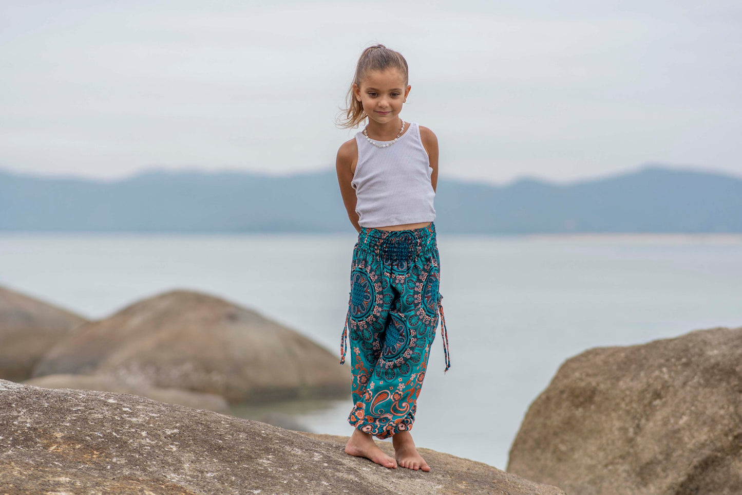 türkis orange gemusterte Pluderhose für Kinder