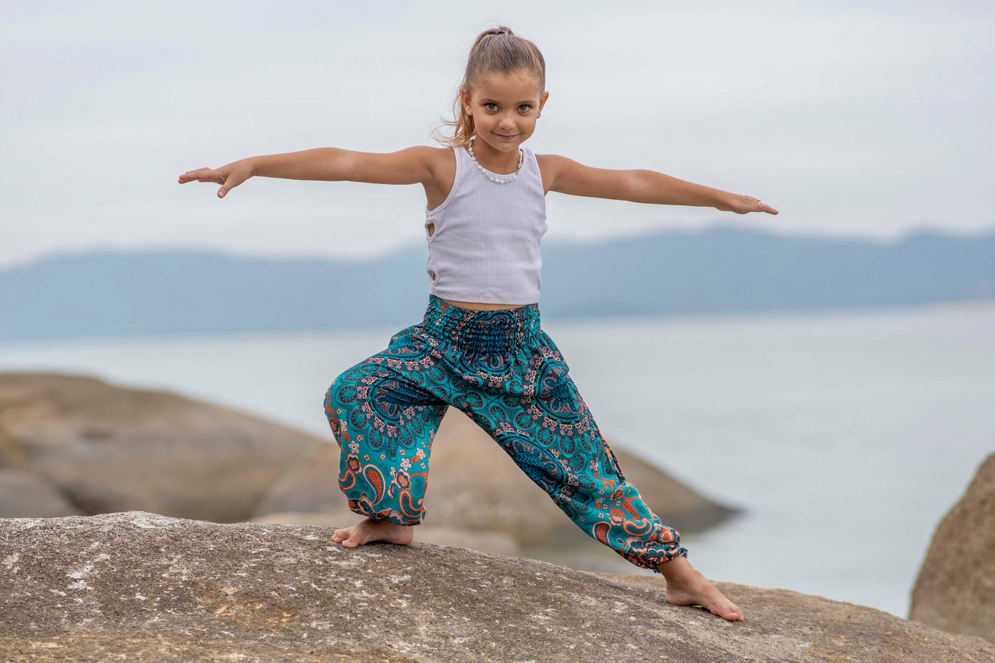türkis orange gemusterte Pluderhose für Kinder
