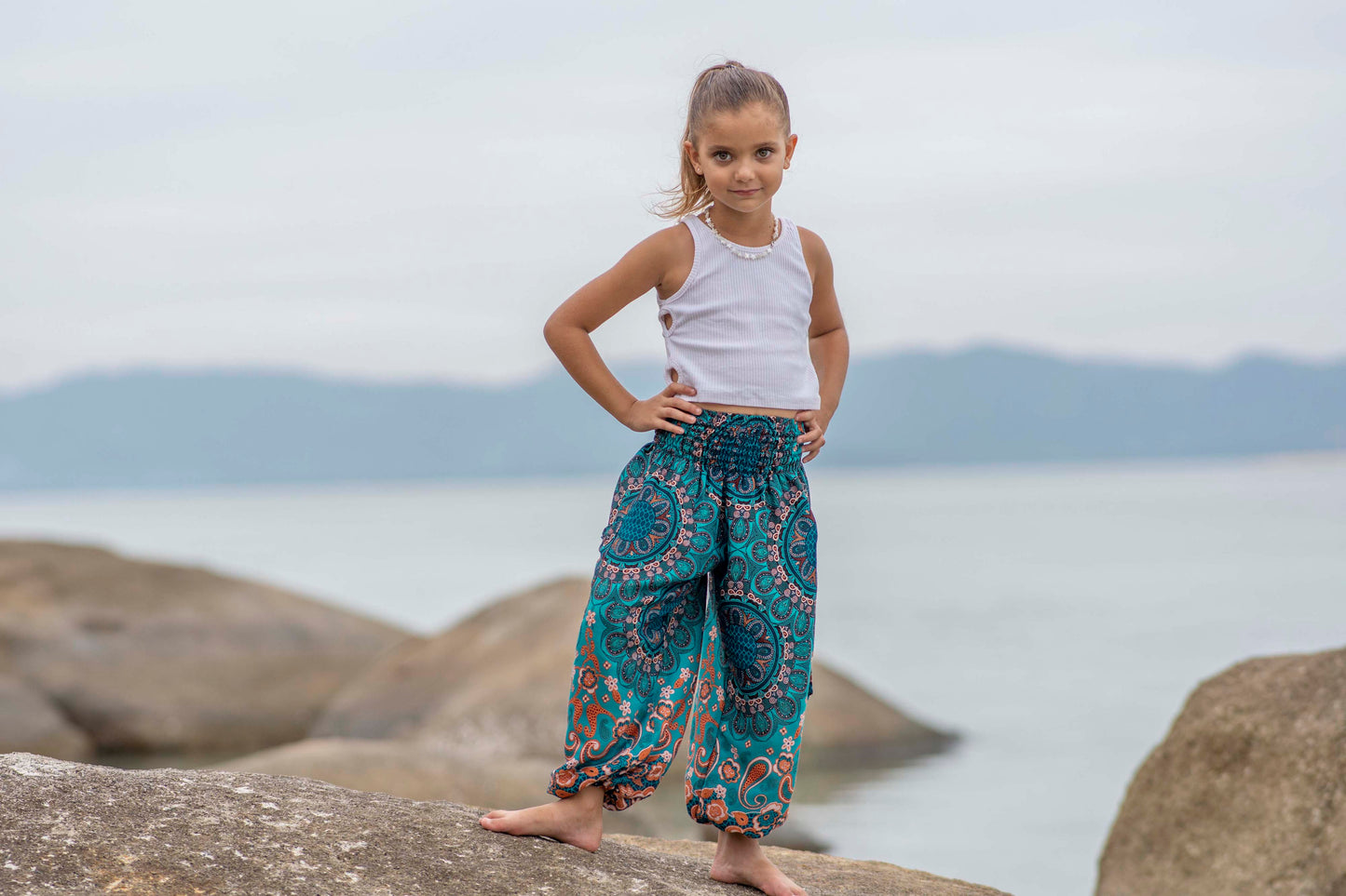 türkis orange gemusterte Pluderhose für Kinder