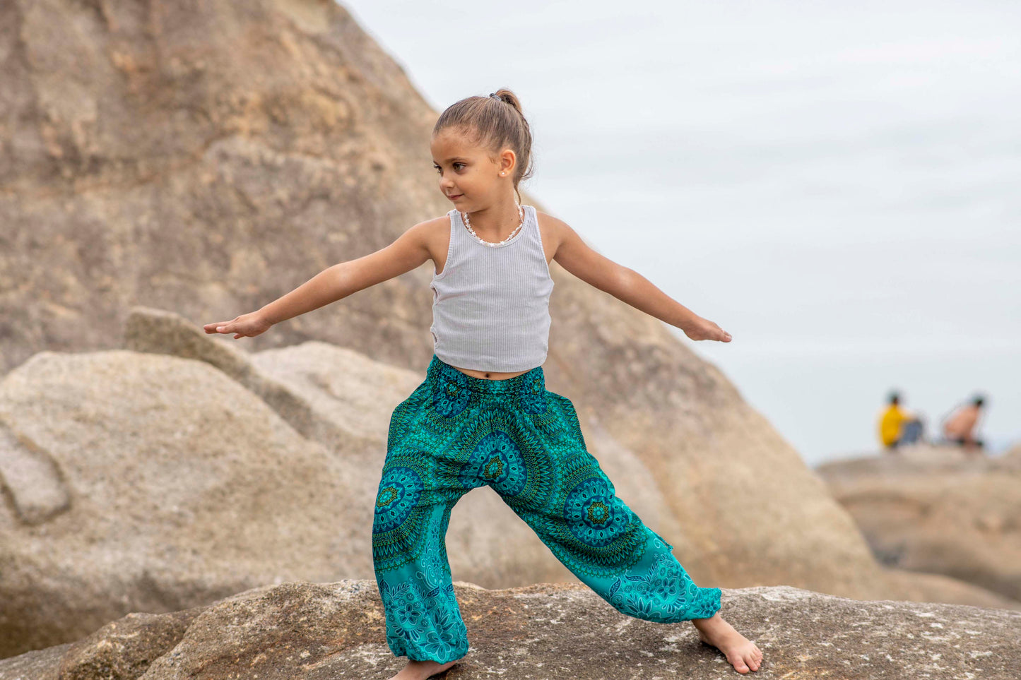 Patterned harem pants with a mandala pattern in blue and turquoise for children