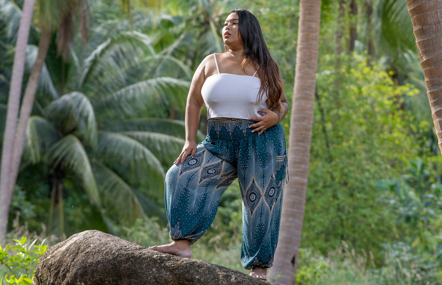 PLUS SIZE harem pants with a peacock pattern in turquoise