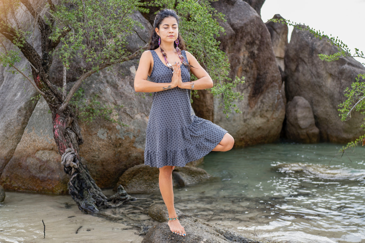 Sleeveless dress with ruffles, gray with the flower of life pattern