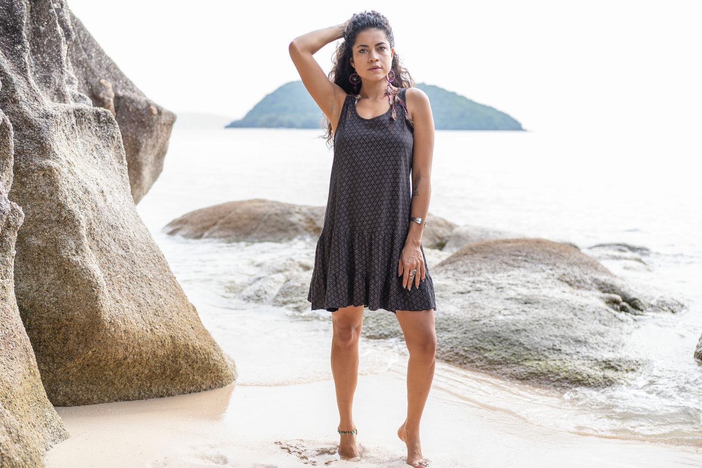 Sleeveless dress with ruffles, black with the flower of life pattern