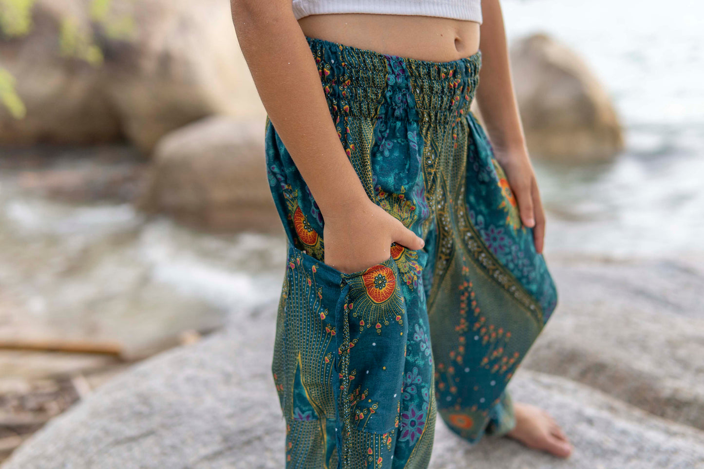turquoise orange patterned harem pants with peacock pattern for children