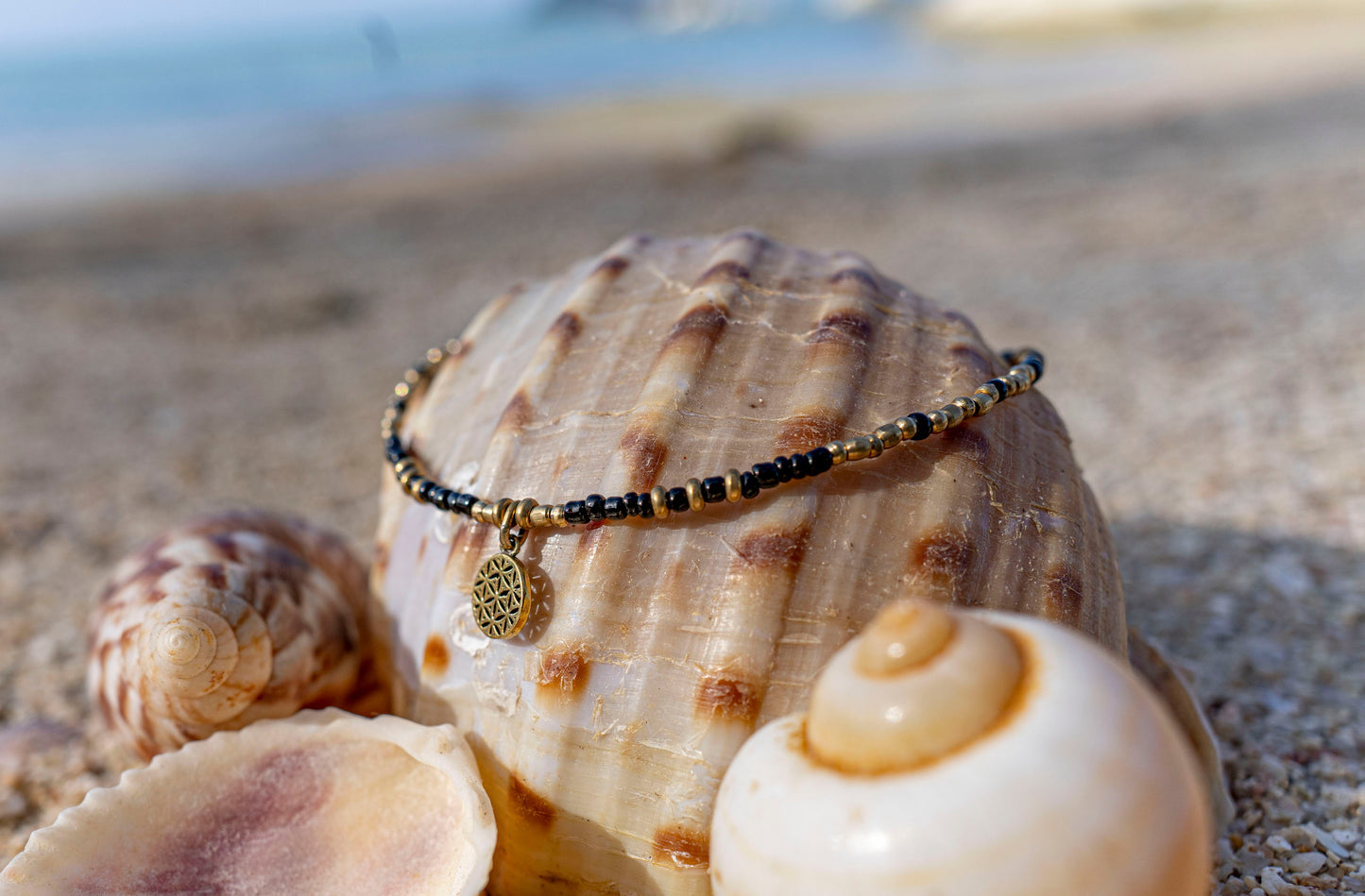 Anklet with the motif of the flower of life made of brass