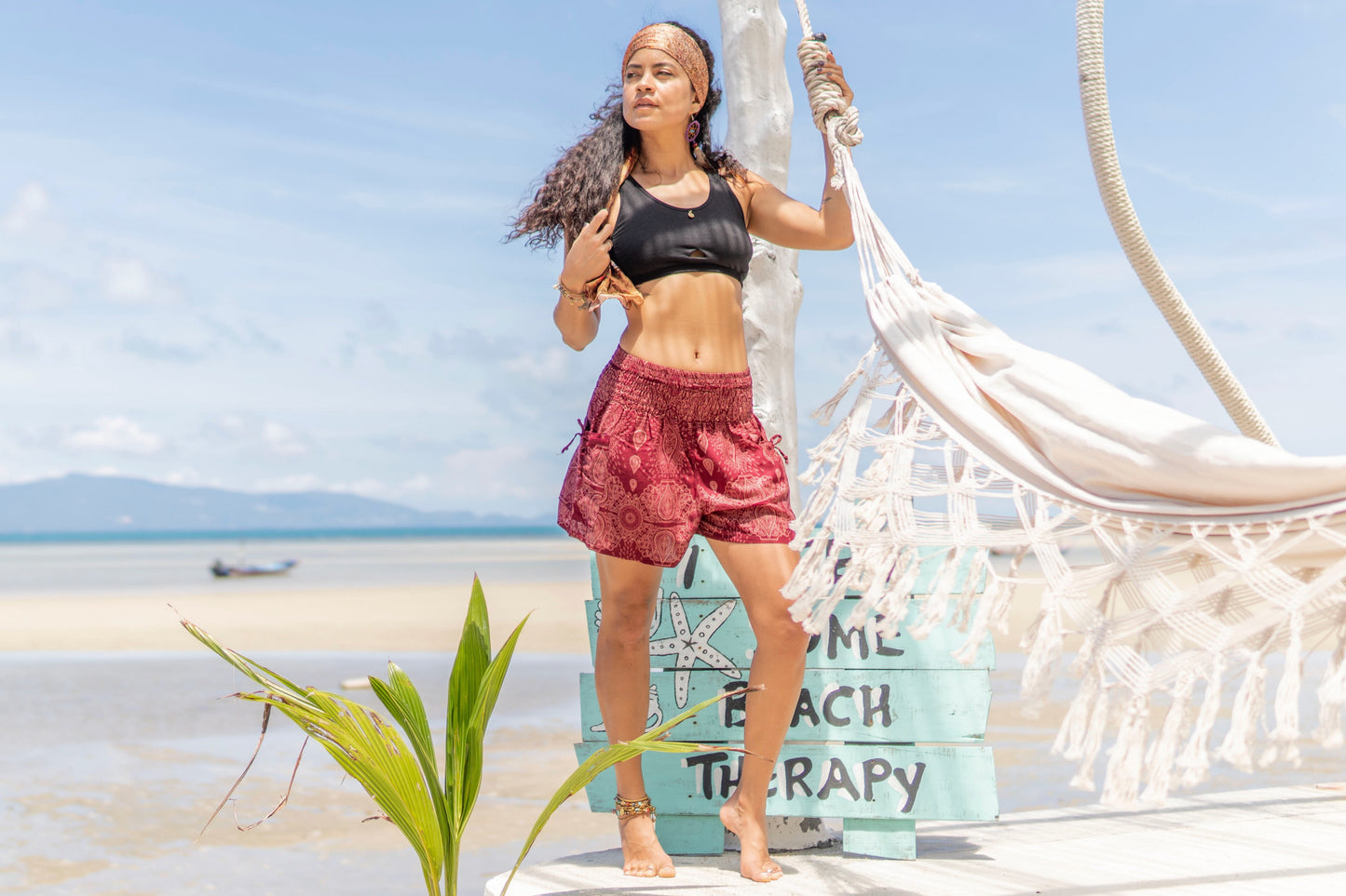 Airy, light summer shorts with a filigree pattern in red