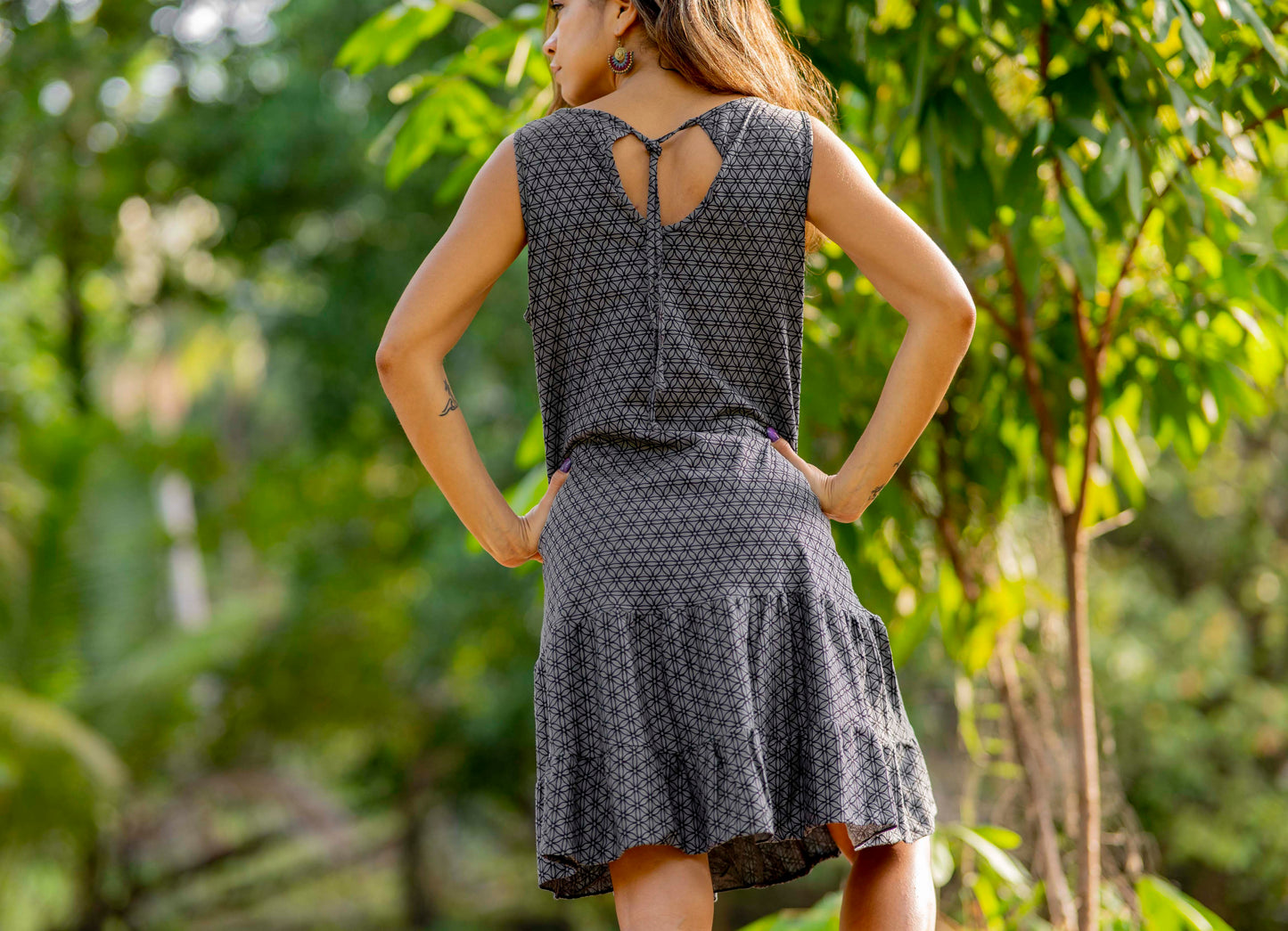 Sleeveless dress with ruffles, gray with the flower of life pattern