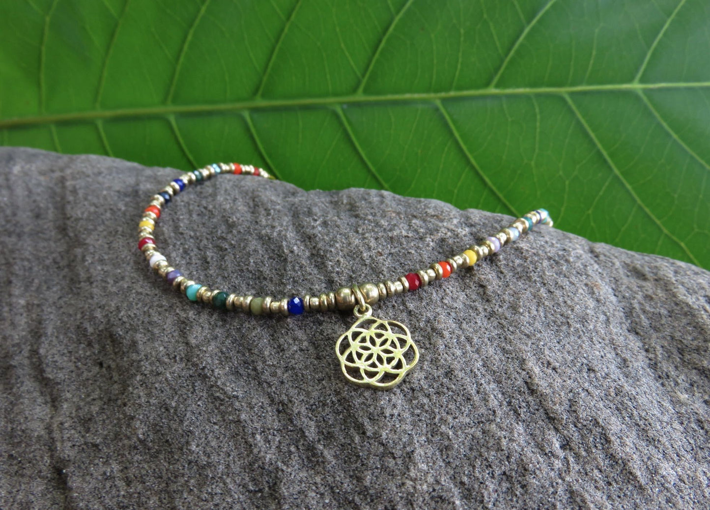 colorful anklet with flower pendant made of brass