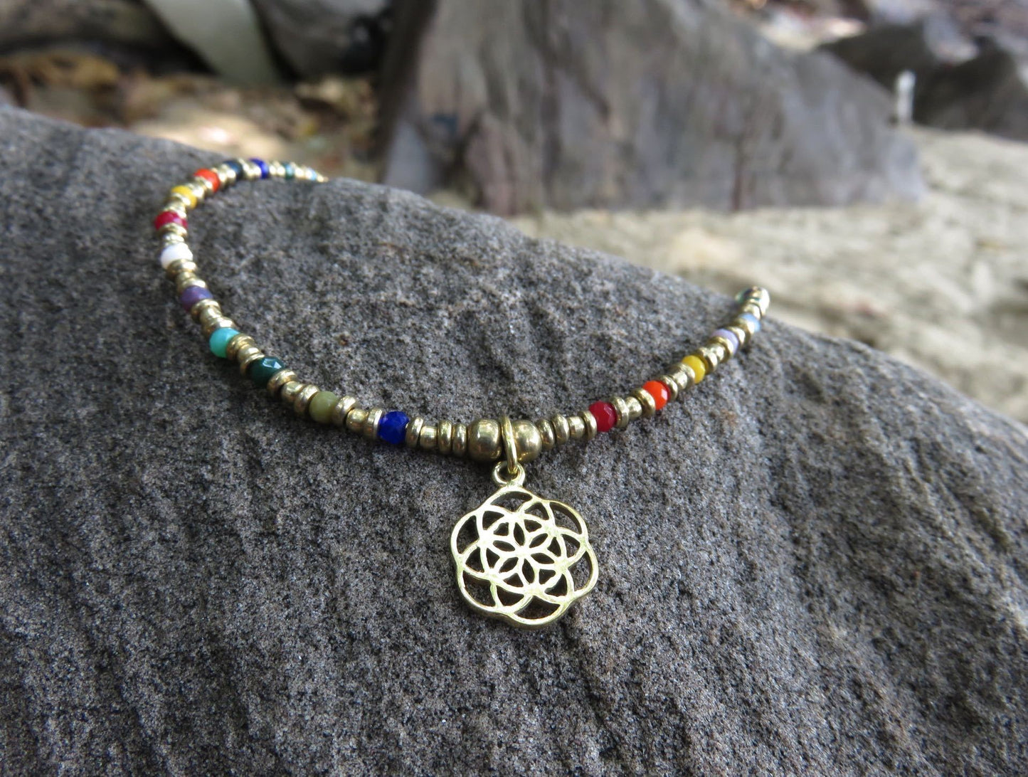 colorful anklet with flower pendant made of brass