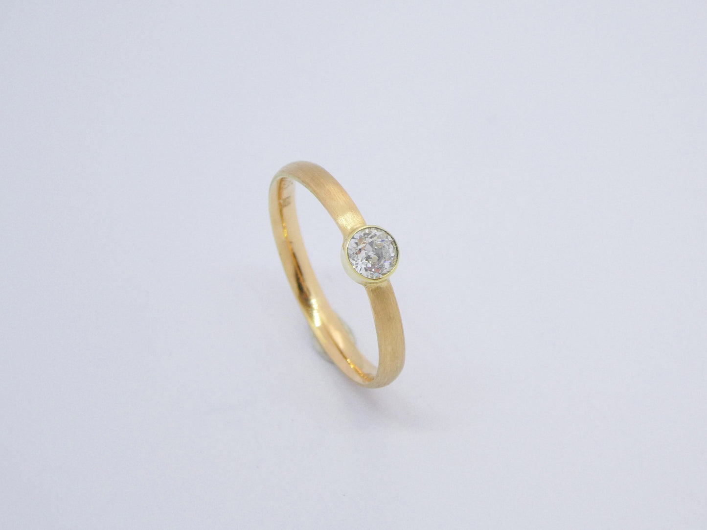 handcrafted gold ring with diamond