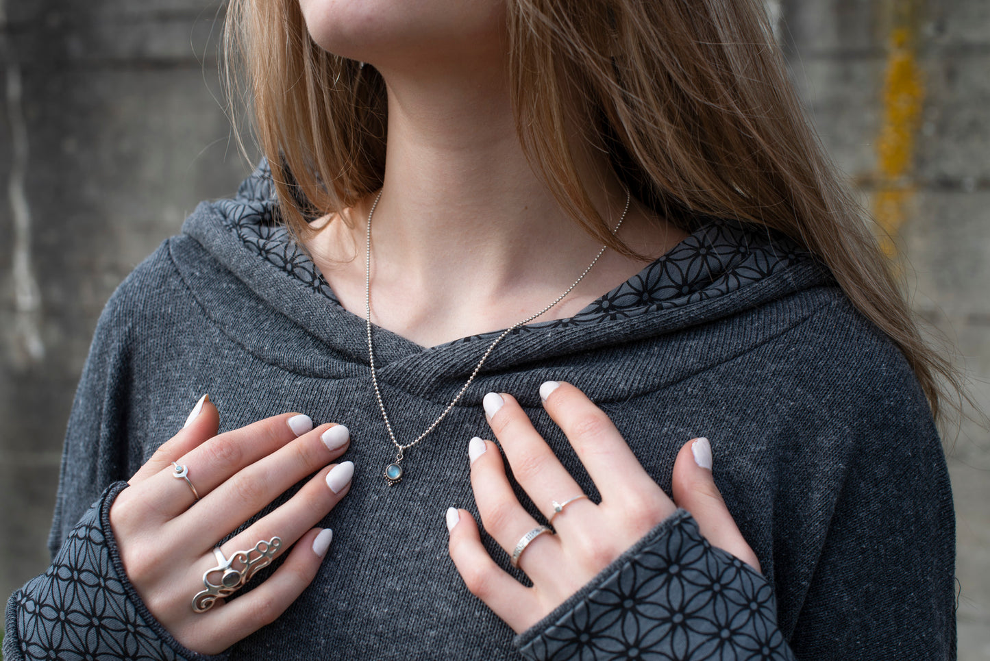 half-length knitted sweater with hood in gray