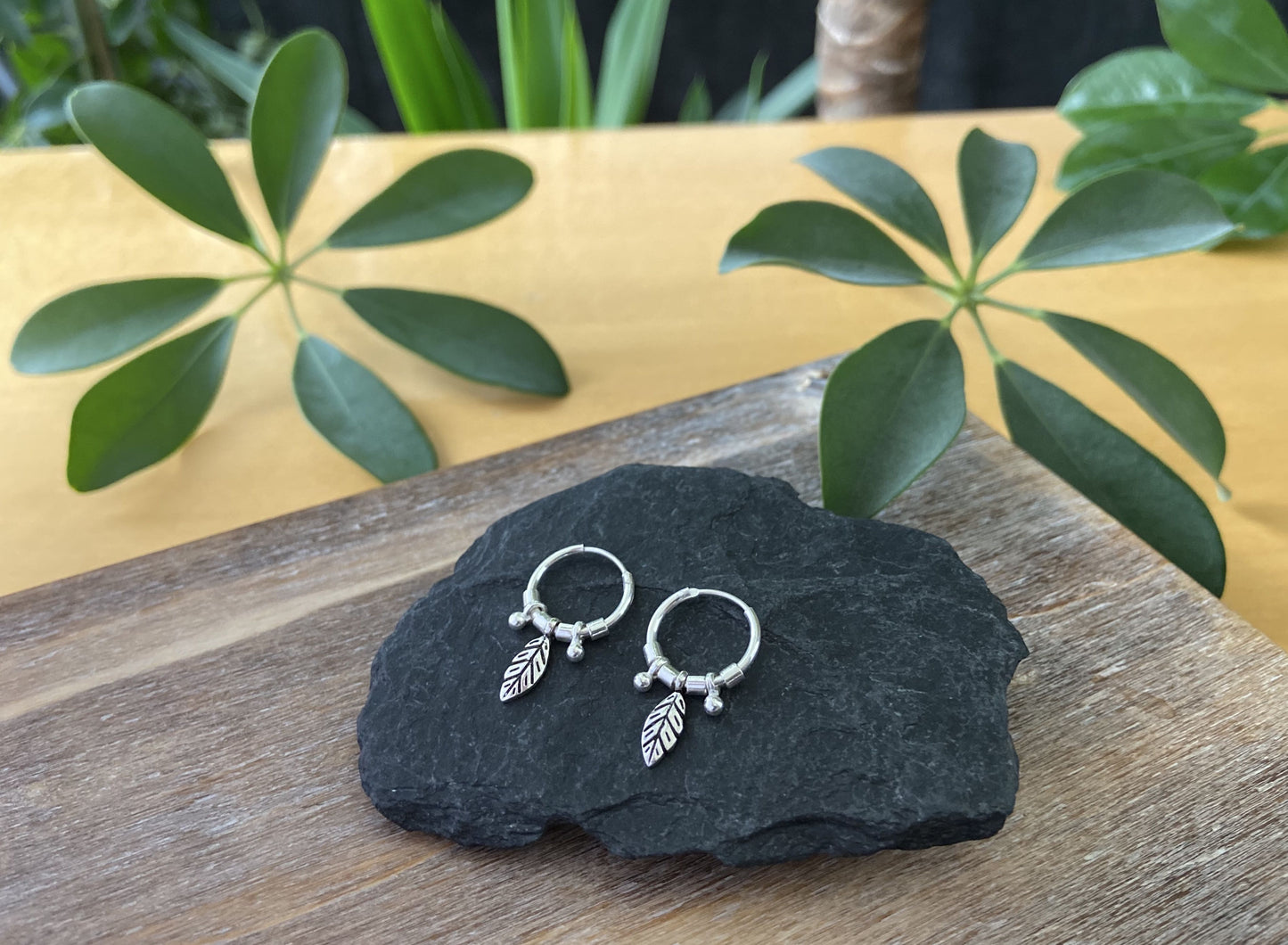 small silver hoop earrings with leaves, beads and beads