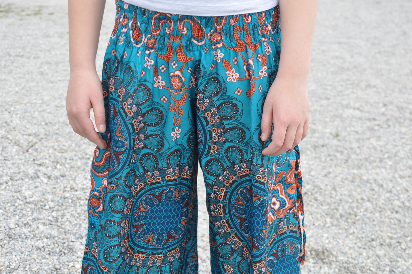 türkis orange gemusterte Pluderhose für Kinder