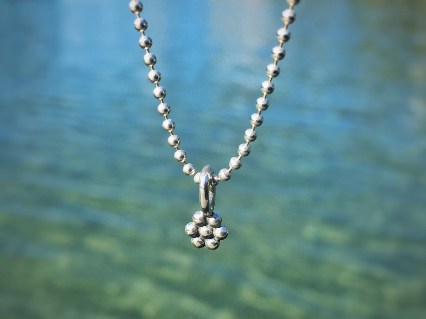 Ball chain with flower pendant made of silver