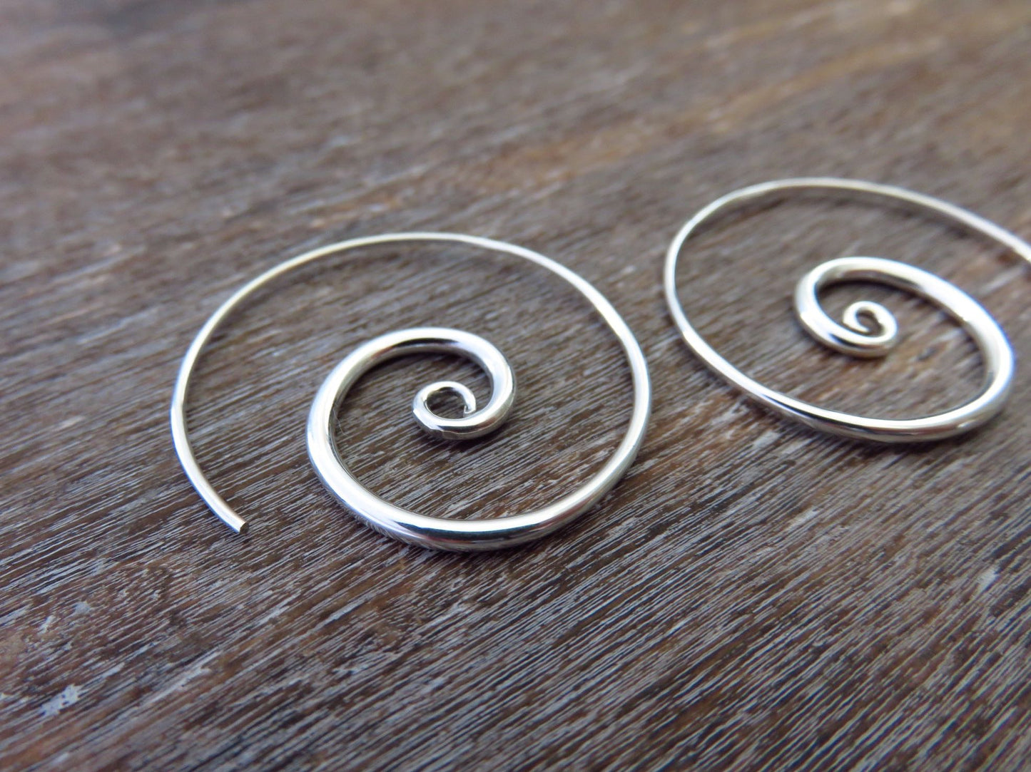 simple spiral earrings made of silver
