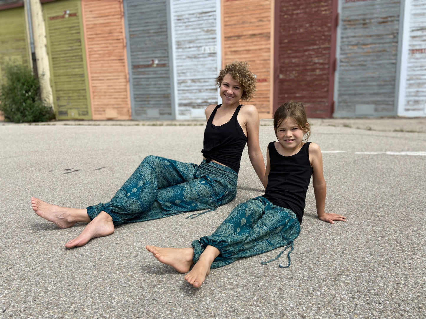 Airy turquoise harem pants with a delicate pattern for children