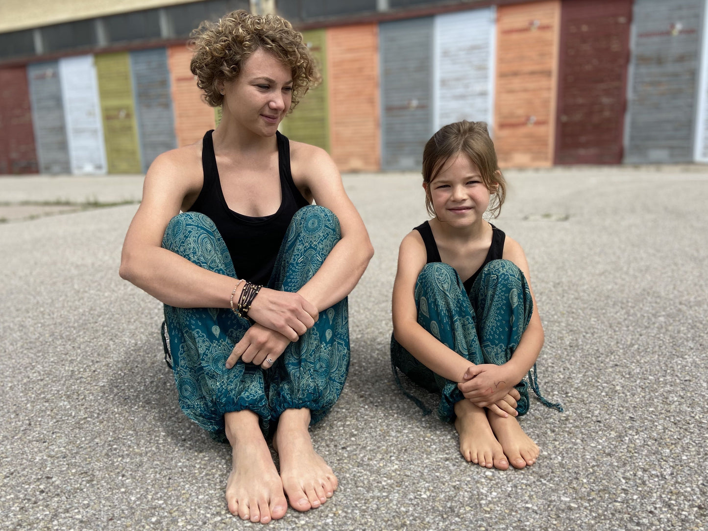 Airy turquoise harem pants with a delicate pattern for children