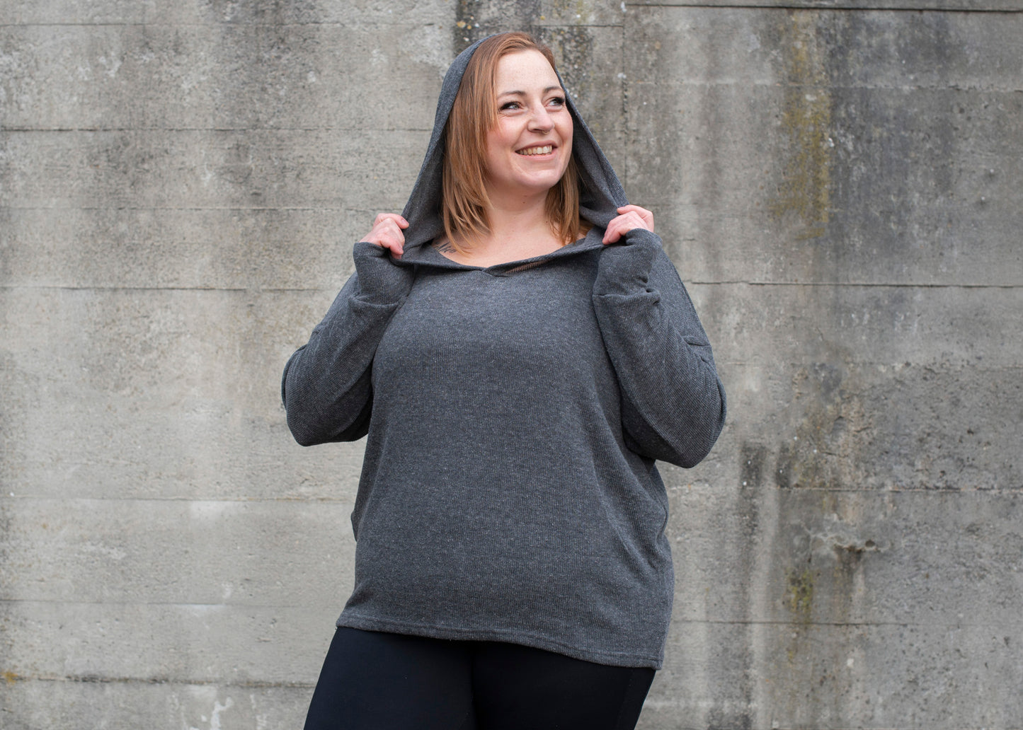 PLUS SIZE, long, plain knitted sweater with a large hood and thumbholes in gray