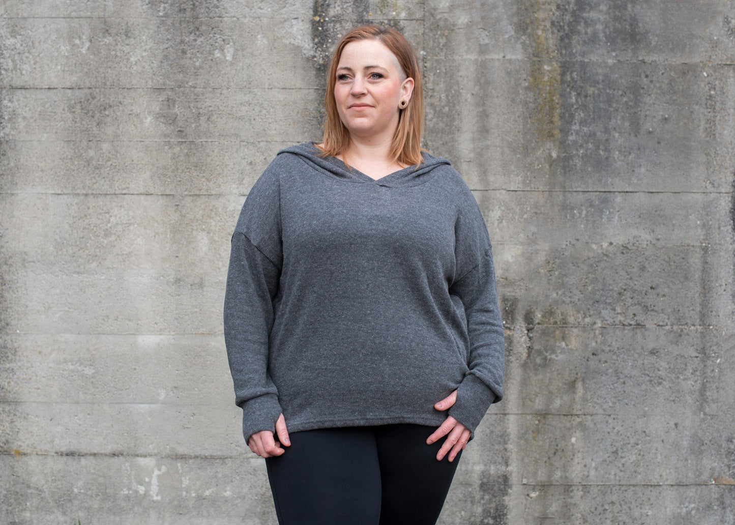 PLUS SIZE, long, plain knitted sweater with a large hood and thumbholes in gray